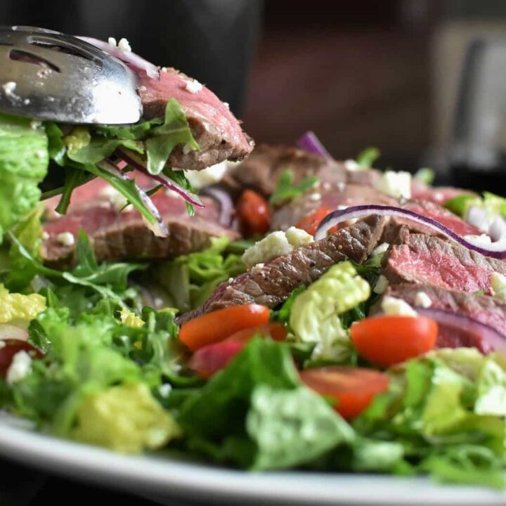 Steak Salad Close Up Action Shot with watermark