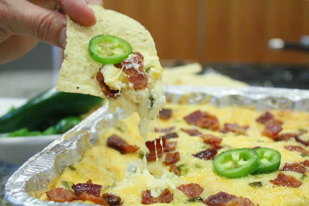 Jalapeno Popper Dip with chip and jalapeno c