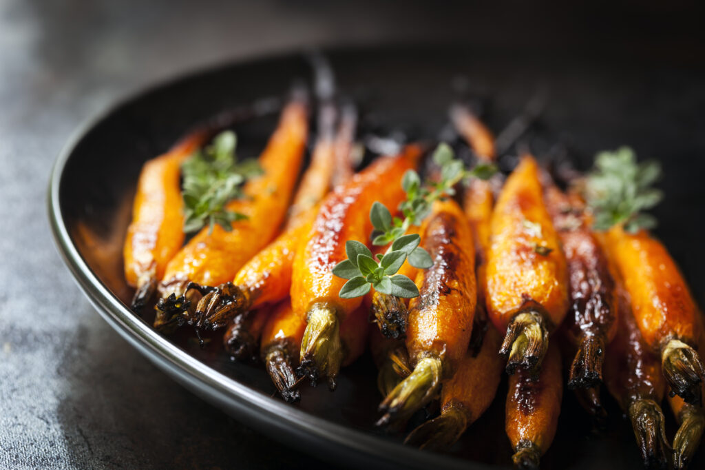 glazed carrots in a dish horizontal