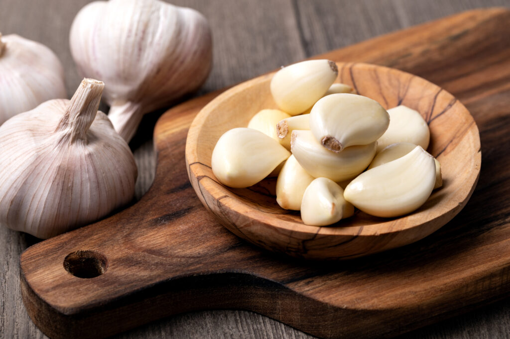 peeled garlic in dish