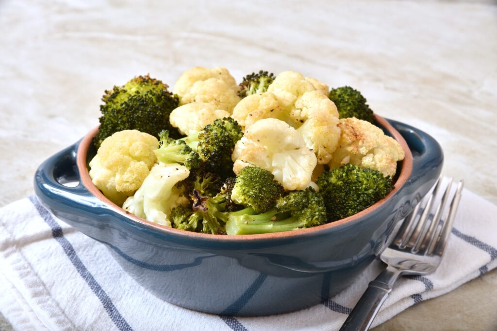 Air Fryer Broccoli and Cauliflower cooked in a bowl